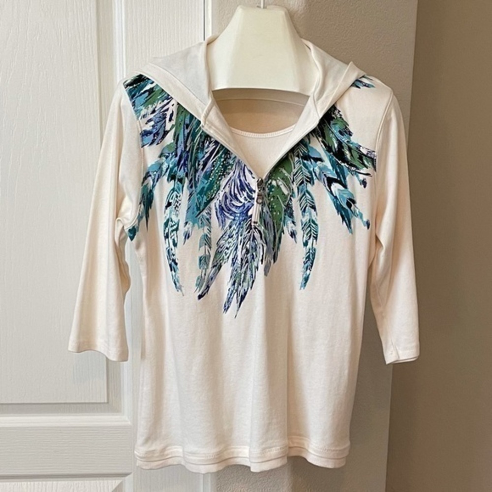Style & Co. cream hoodie with blue & teal feathers